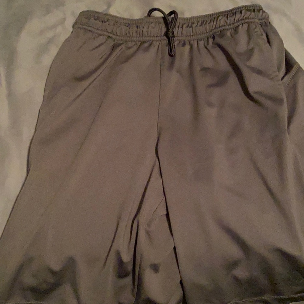 Gray athletic shorts.